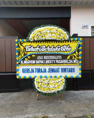 Papan Bunga Duka di Tutuk Tolu